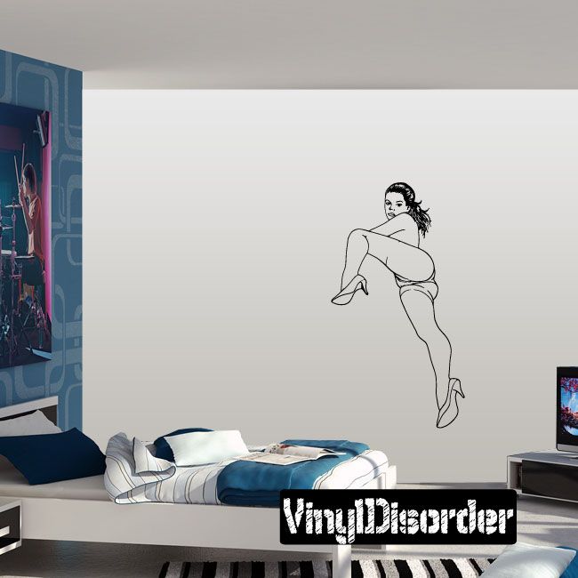 Reclining woman wall decal in short shorts and high heels, black line art