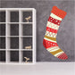 Christmas stocking with red cuff, grid and dot pattern, striped red and gold design