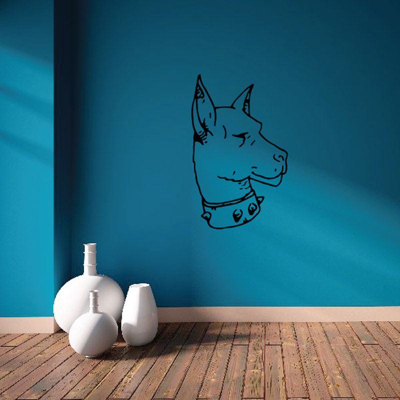 Blue dog head decal with regal style outline on wall