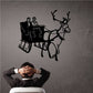Reindeer pulling sleigh with couple wall decal in black silhouette