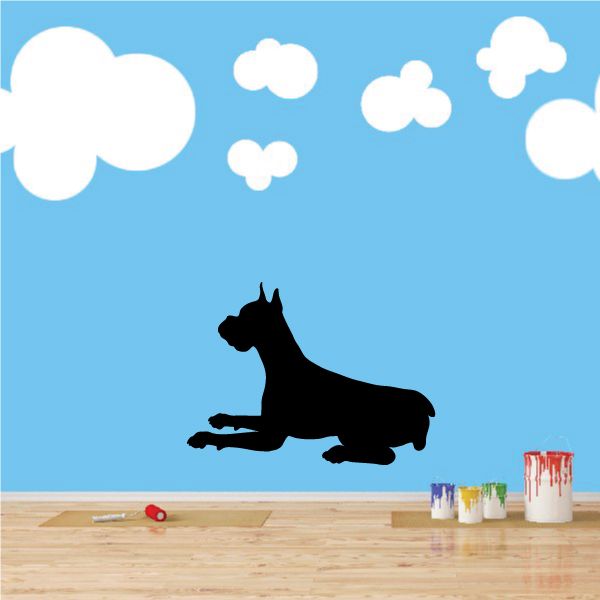 Resting boxer dog decal with cloud accents