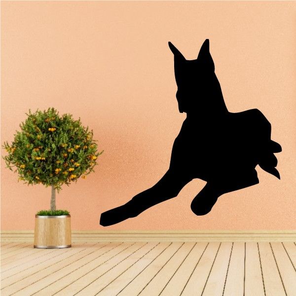 Black Great Dane resting dog silhouette vinyl decal