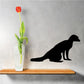 Resting meerkat decal with black silhouette and curled paws