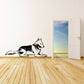 Resting timber wolf wall decal, black-and-white outline design