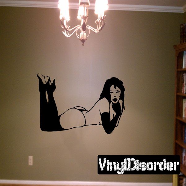 Resting nude woman wall decal in black silhouette