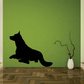 Resting wolf watching wall decal, black silhouette with raised tail