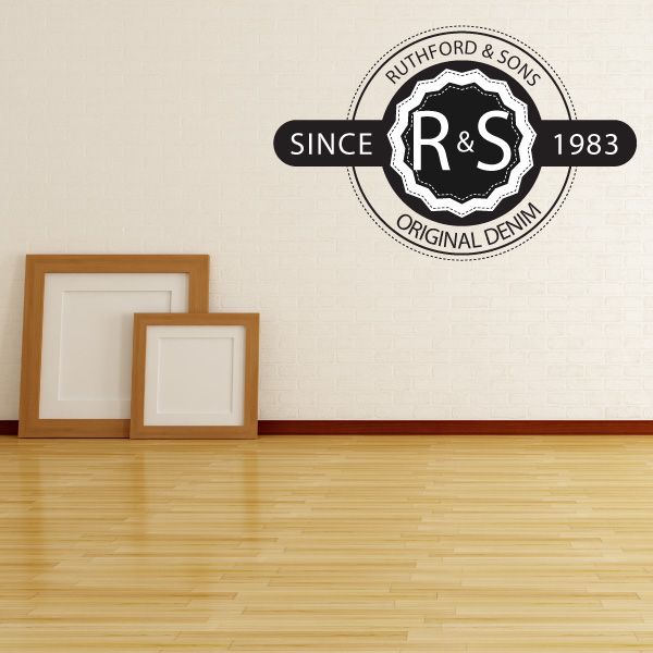 Circular vinyl wall decal badge with denim-style logo, text 'Since 1983' and 'Original Denim'.