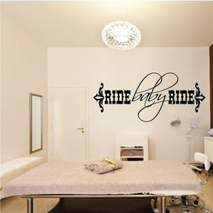 Vinyl wall decal with “Ride Baby Ride” script lettering