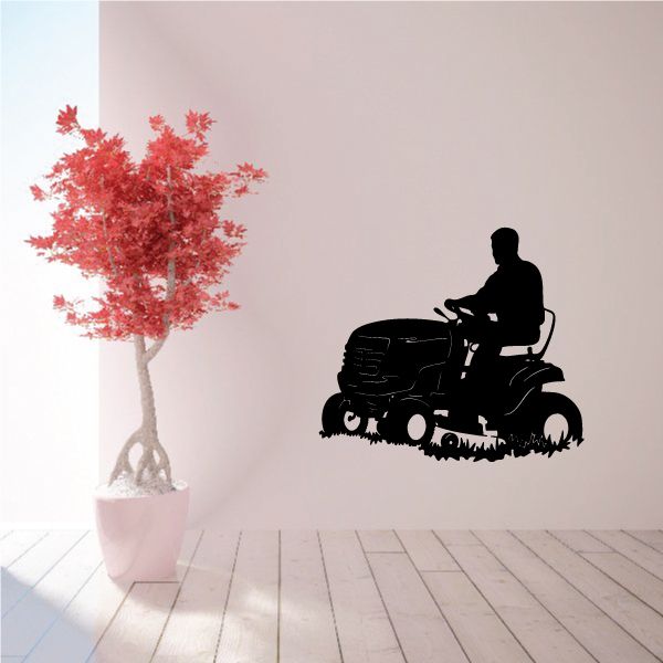 Riding lawnmower decal with rider silhouette, black graphic