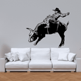 Rodeo-inspired wall graphic of a cowboy in mid-ride on a bull