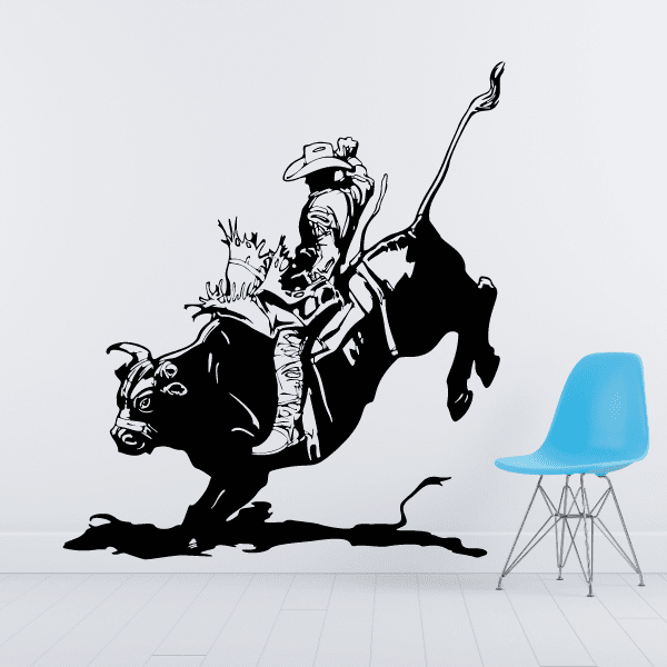 Sticker design of a cowboy expertly riding a bucking bull