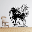 Cowboy-on-bull motif wall decal for a rodeo enthusiast