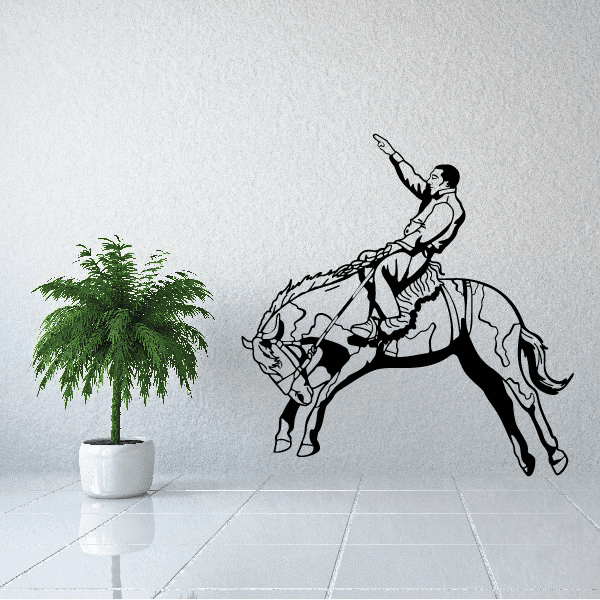 Horseback riding cowboy depicted in a wall decal