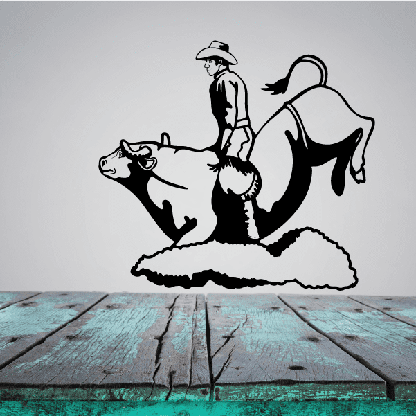 Wall art sticker of a rodeo cowboy on a bucking bull