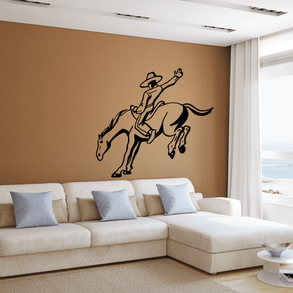 Cozy living room accented with a horse-riding cowboy wall decal