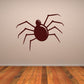 Round-bodied spider wall decal in dark maroon, with eight legs.