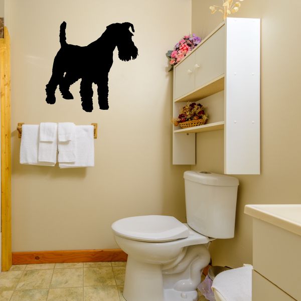 Roxy dog decal with black standing terrier silhouette on a light wall.