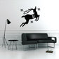 Black Rudolph reindeer silhouette wall decal with antlers and star accents