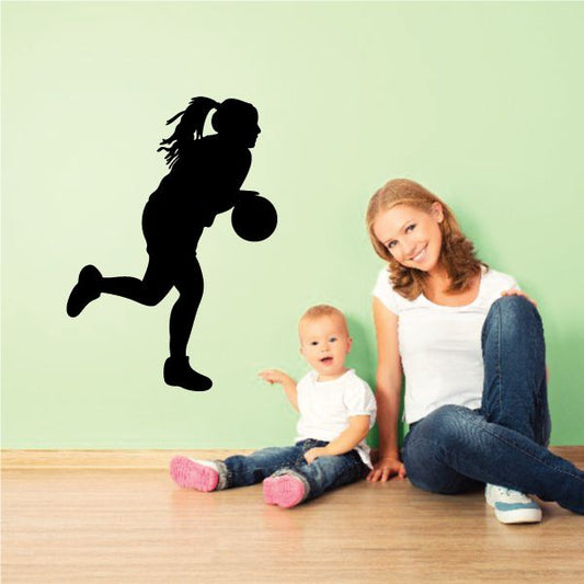 Image of Running Female Basketball Player Decal