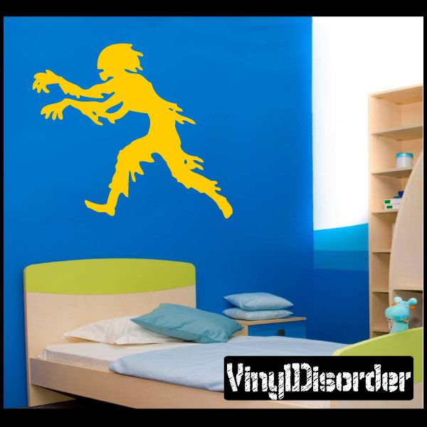 Running zombie decal, yellow zombie silhouette running on blue wall