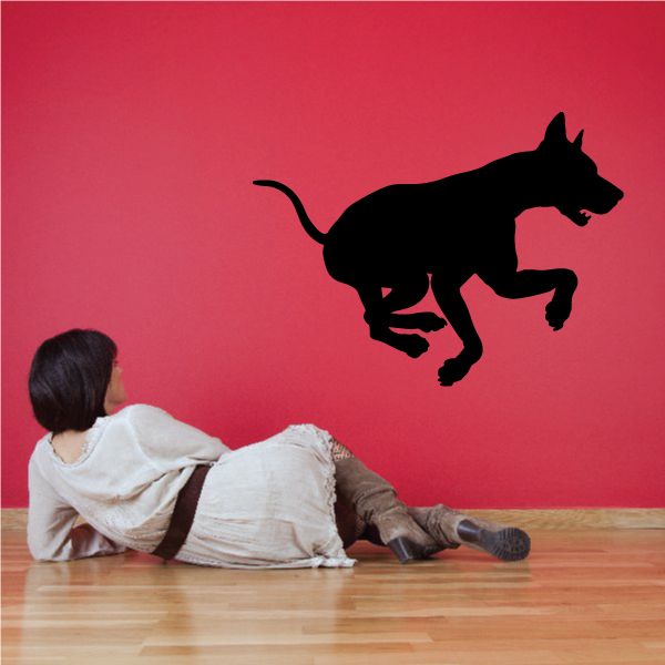 Rushing Doberman Pinscher decal, black dog silhouette running to the right.