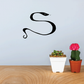 S-shaped snake wall decal, glossy black coiled design