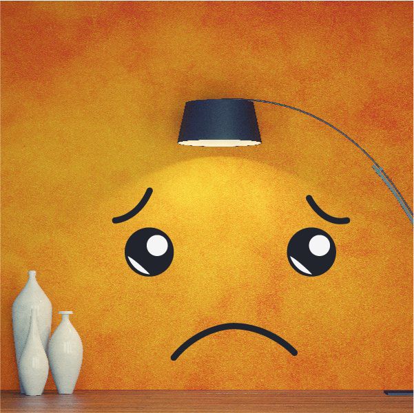 Sad face expression wall decal with black eyes, brows, and curved frown in vinyl