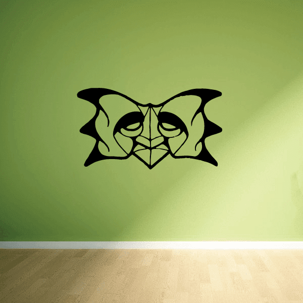 Stylized black mask decal with skeletal eyes and winged design
