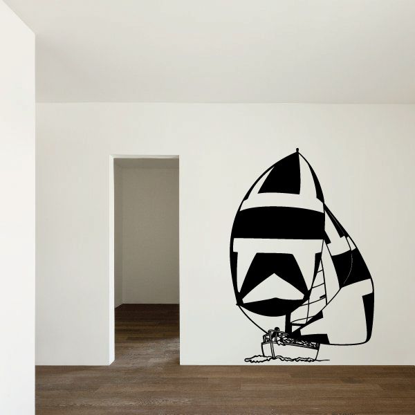 Black and white sailboat vinyl wall decal with sail and small waves at base