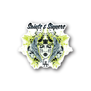 Vinyl sticker with illustrated angel face and devil crown, green and blue ink graphic