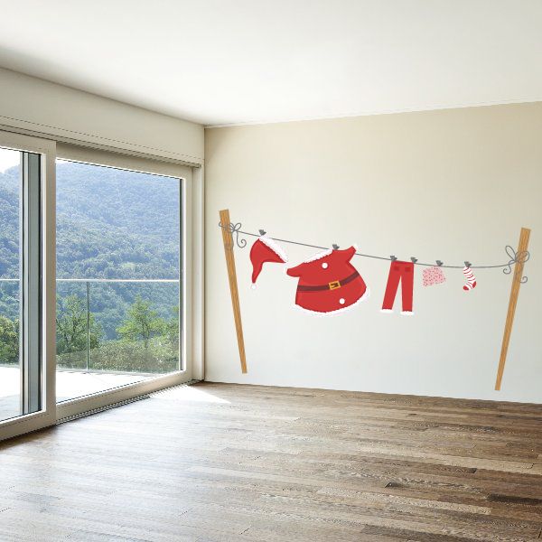 Santa Claus clothesline vinyl wall decal with red shirt, pants, socks, and flags