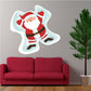 Santa making snow angels sticker, white outlined winter pose with red hat and suit