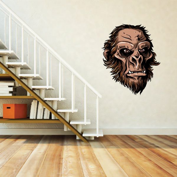 Sasquatch head sticker with detailed face illustration, brown fur and beard, black eyes