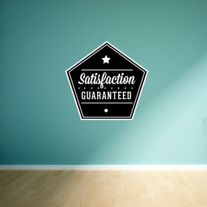 Hexagon wall decal badge with black background, white border, Satisfaction Guaranteed lettering