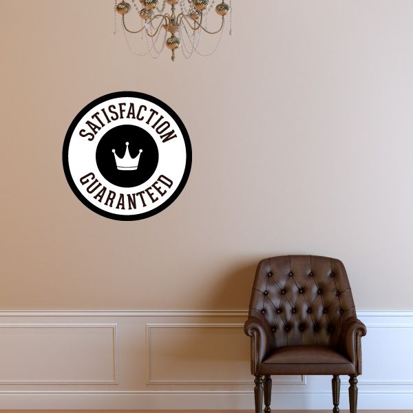 Round vinyl wall decal: black circle with SATISFACTION GUARANTEED and crown icon