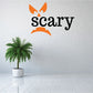 Scary pumpkin face text decal with orange jack-o-lantern eyes and mouth