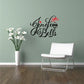 Jingle Bells wall decal in black script with red bow and bell icon