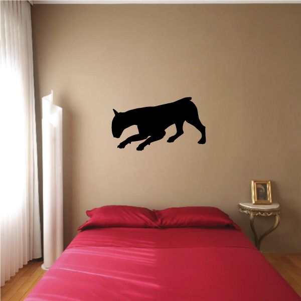 Searching bull terrier decal with black dog silhouette in a walking pose
