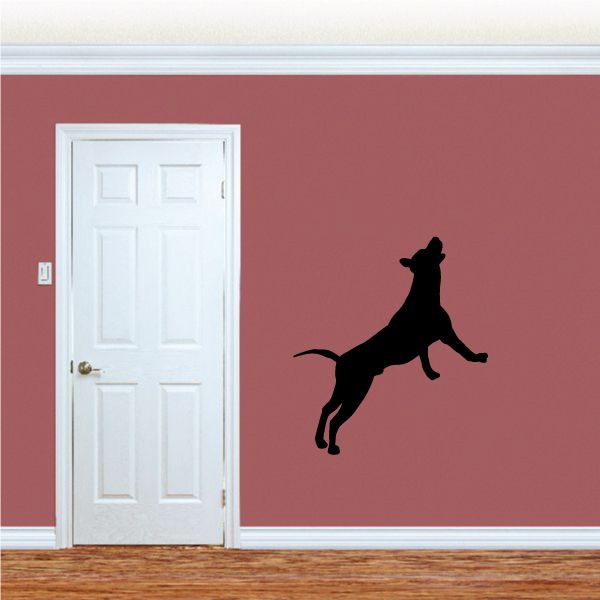 Dog decal showing a black silhouette of a searching dog standing on all fours