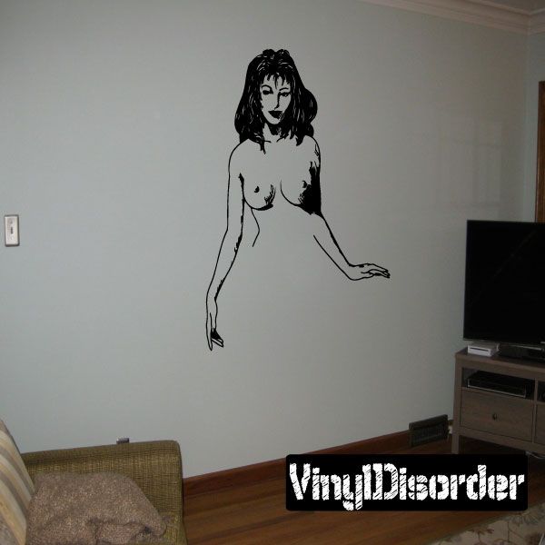 Black wall decal silhouette of a nude woman with long hair, standing pose