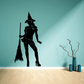 Witch wall decal in silhouette, holding broom in standing pose