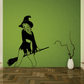 Witch teasing broom decal with long hair, hat, and curling smoke lines
