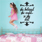 Inspirational wall decal with black script: she believed she could, so she did!