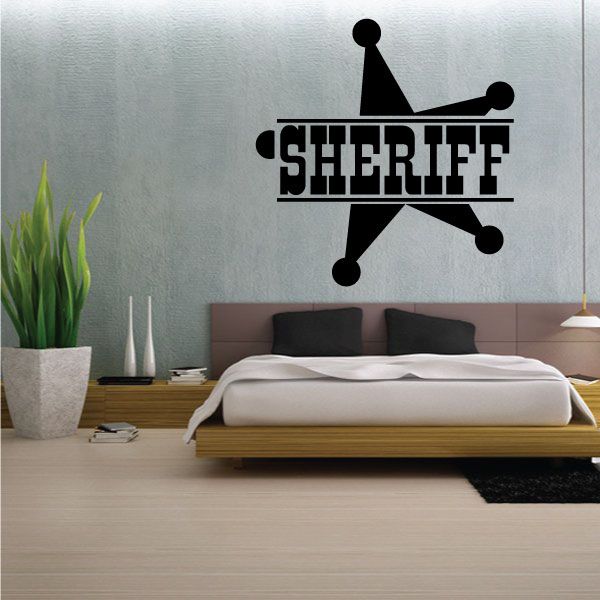 Black vinyl wall decal reading SHERIFF with badge star icon