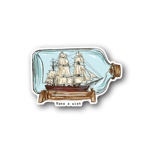Vinyl sticker showing a sailboat in a bottle, brown cork, and Make a wish text