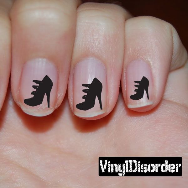 Black high-heel shoe nail decals on natural fingernails