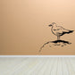 Shore bird wall decal of a seabird perched on a rock, simple line art
