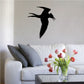 Flying tern bird wall decal, black silhouette with wings spread.