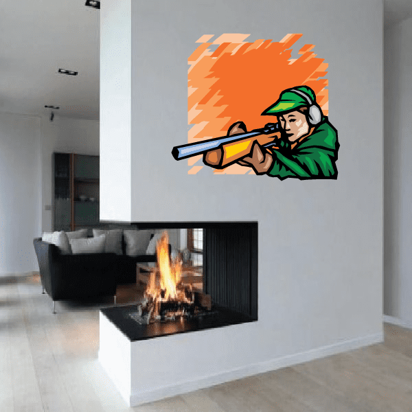Shotgun clay target sticker with orange cartoon hunter holding a shotgun