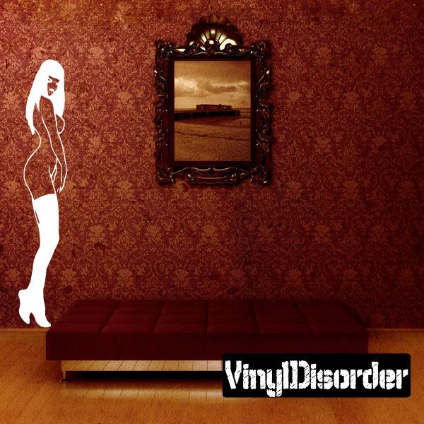 Walking woman decal in nude stockings, full-body white silhouette on wall